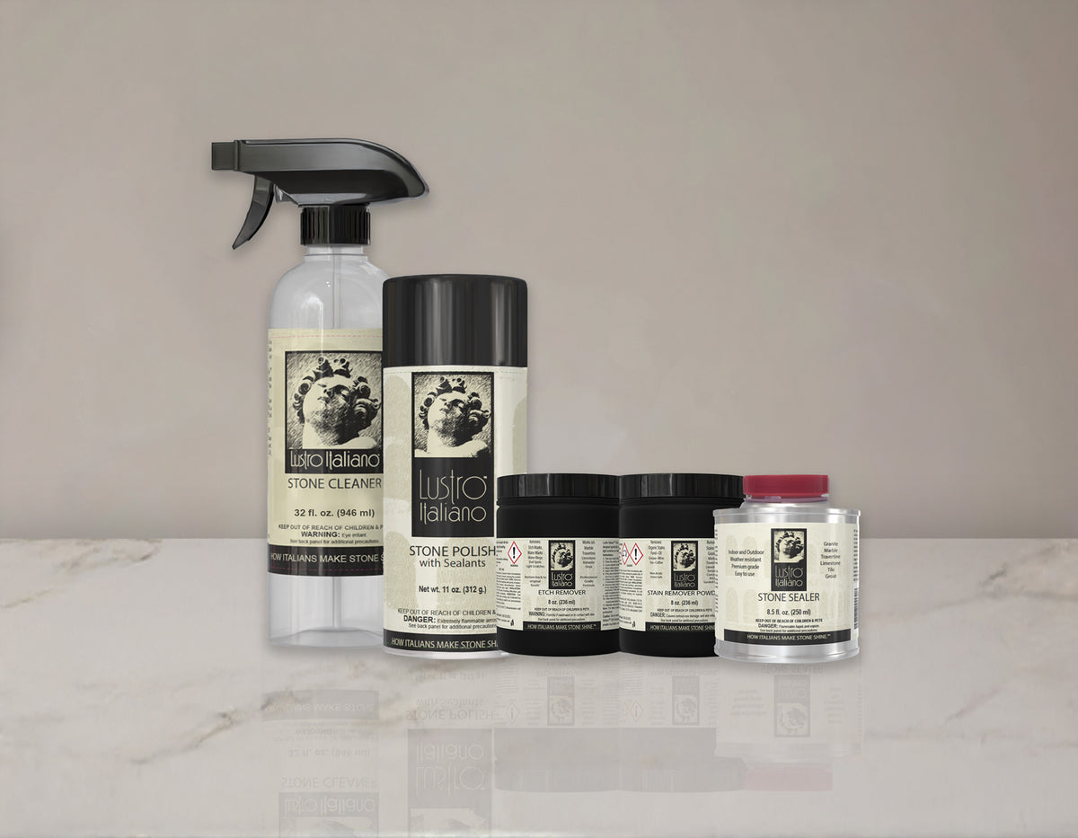 Set of Lusto Italiano stone care products on a marble surface with a neutral background.