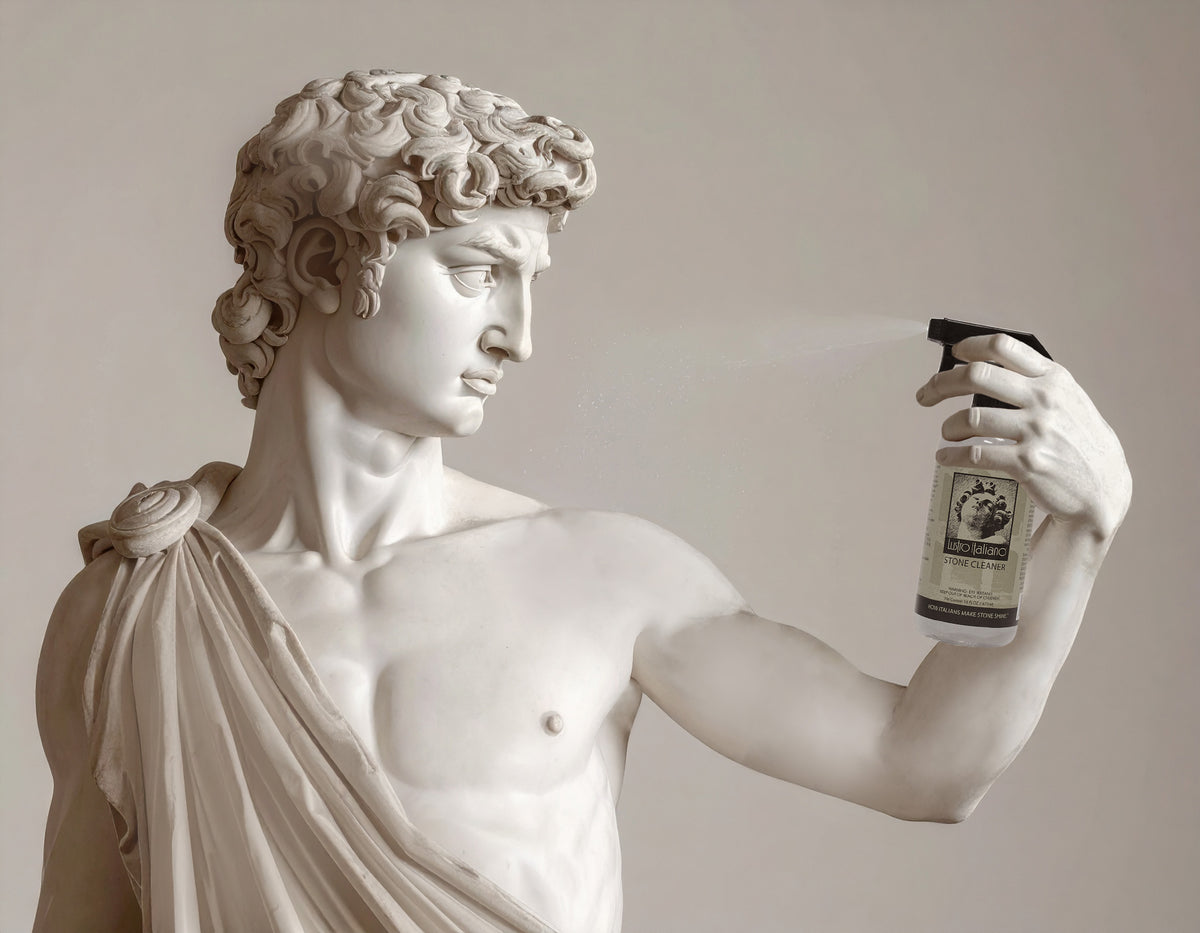 Statue holding a spray bottle of cleaner and spraying himself with it