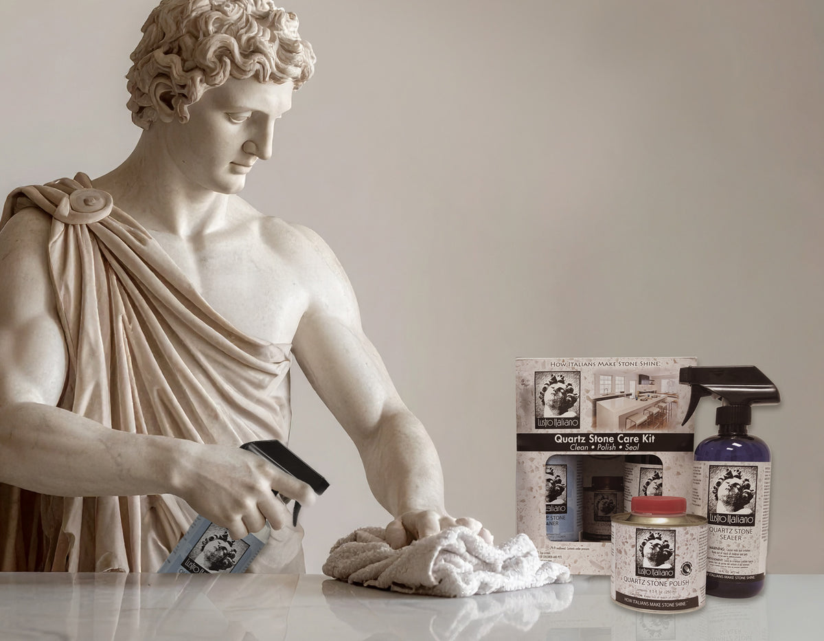 Statue of a classical figure with cleaning products on a marble surface