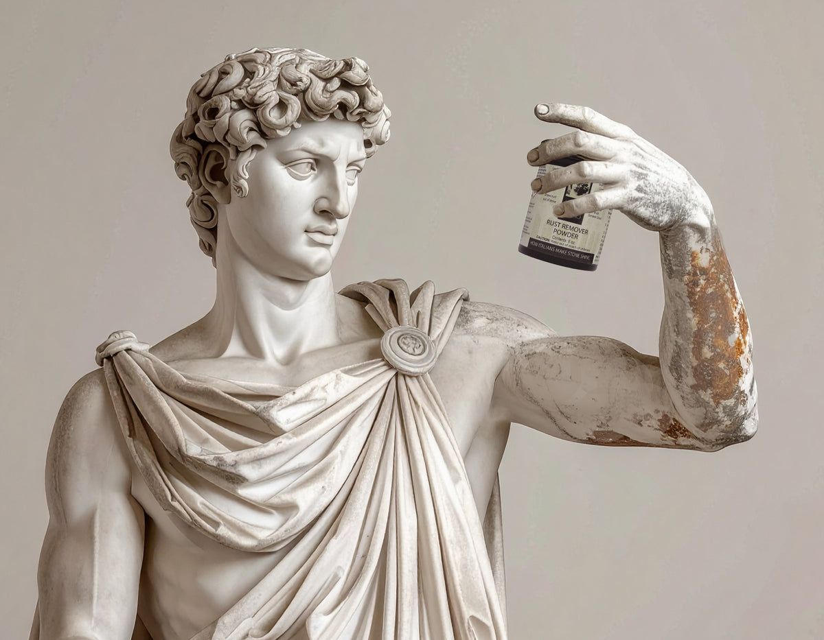 Statue of a rusted classical figure holding a stain remover product against a neutral background